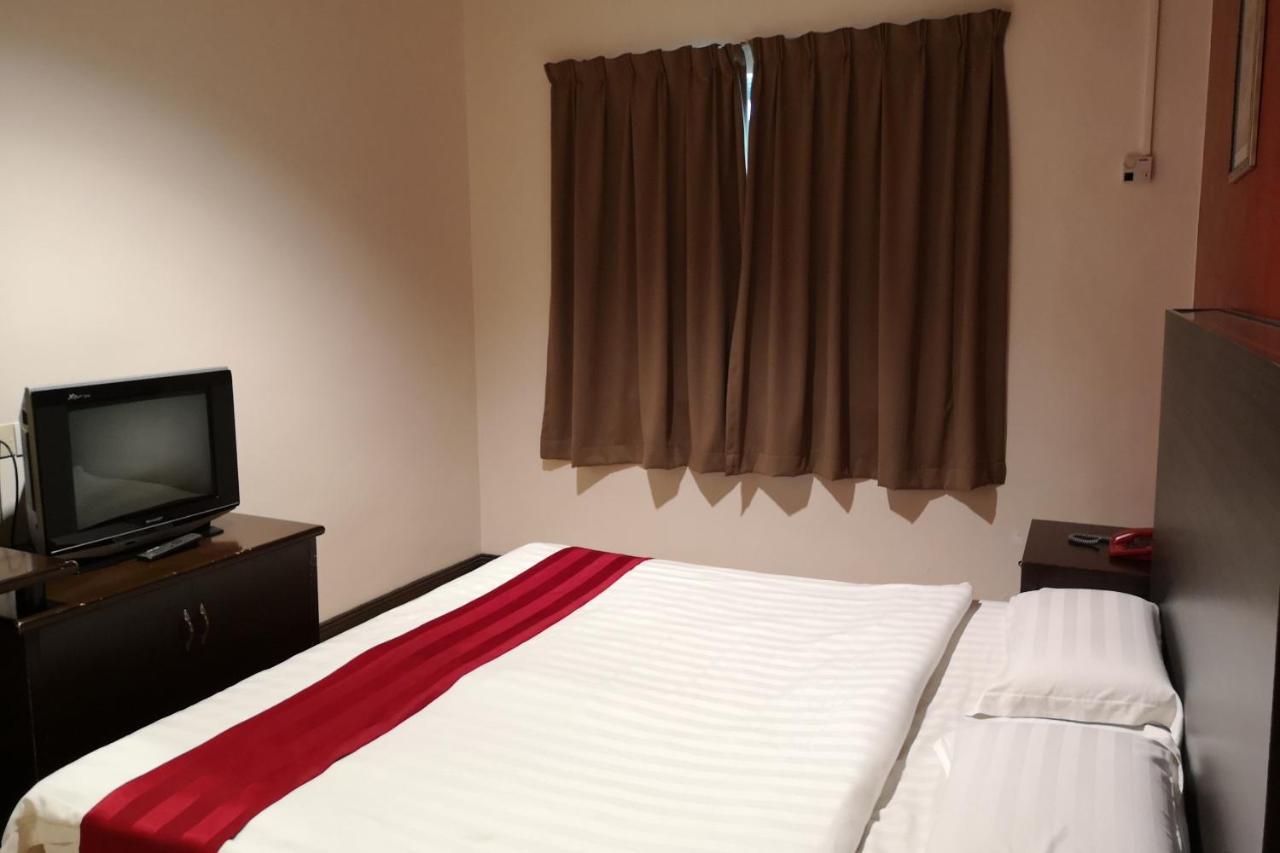 Oyo 89908 Hotel Kensington 산다칸 외부 사진